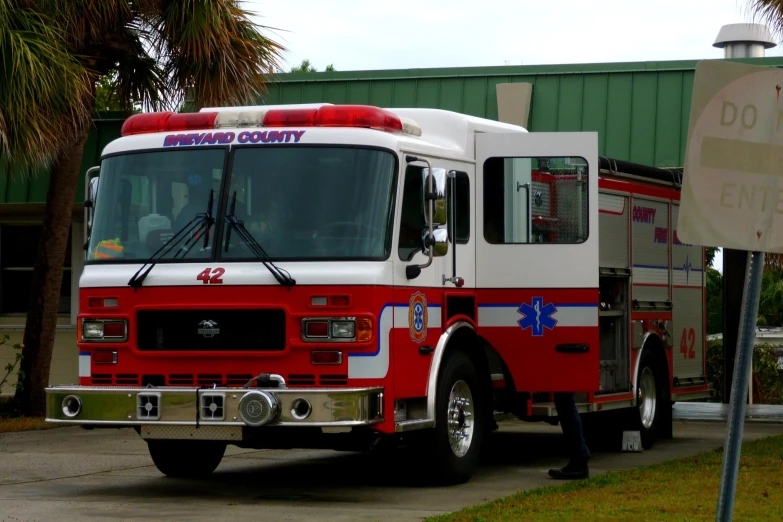 a fire engine sits in a parking lot