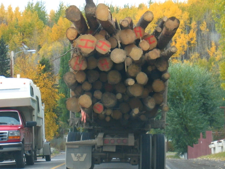 large truck on road with vehicles in roadway