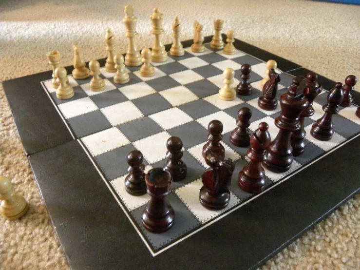 a set of chess pieces is laying on the floor