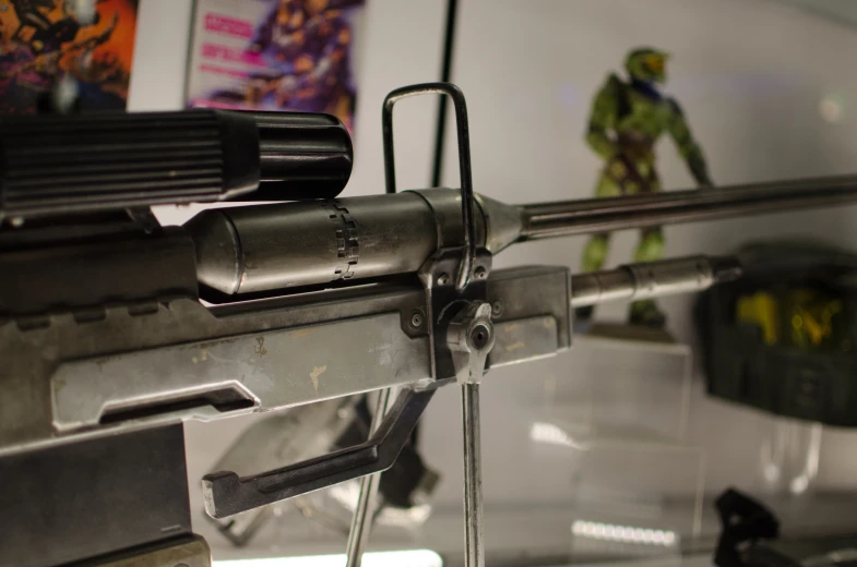 a toy machine gun in a case that has the front view of it