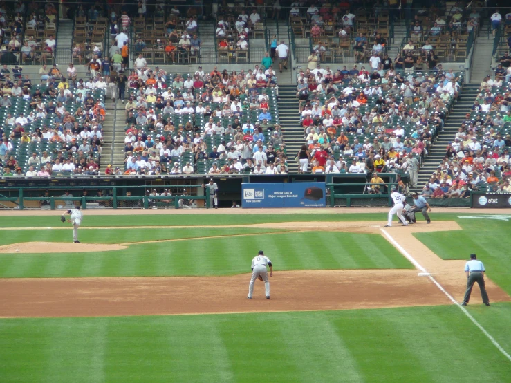 a group of baseball players playing a game