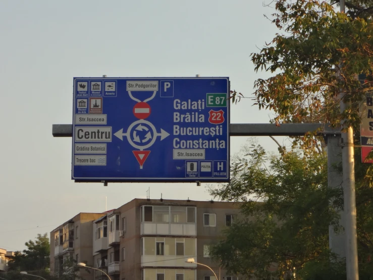 a highway sign showing where to go in the city