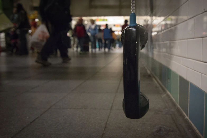 a large number of people walking in a subway