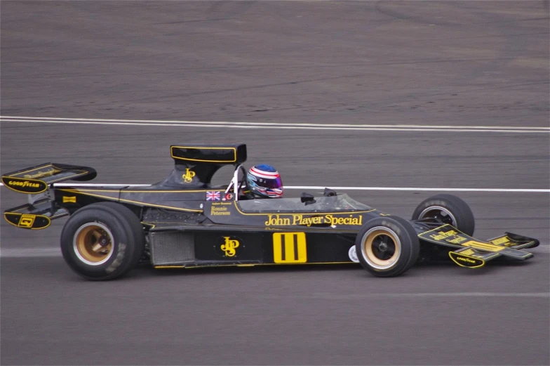 a formula car driving down a race track