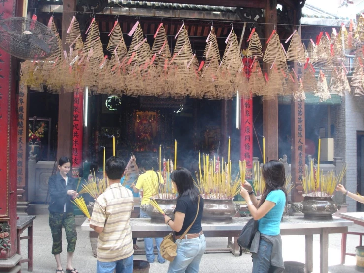 tourists taking pictures of the shrine