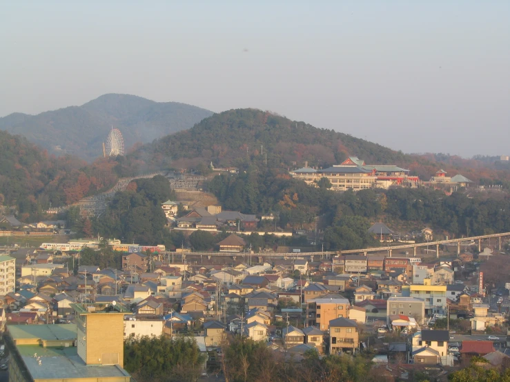 view from above the city area on a hill of trees and buildings