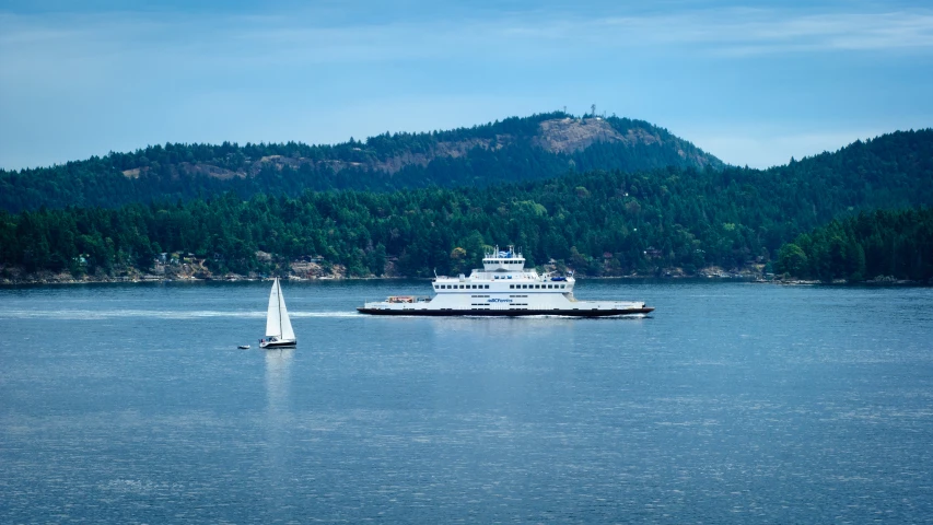 the large boat is leaving the larger boat