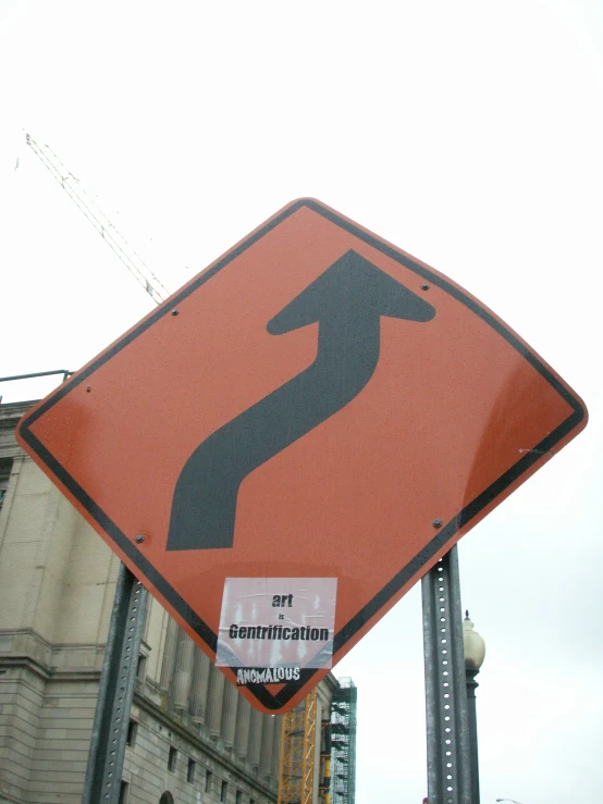 a sign on the side of the street that says no left turn