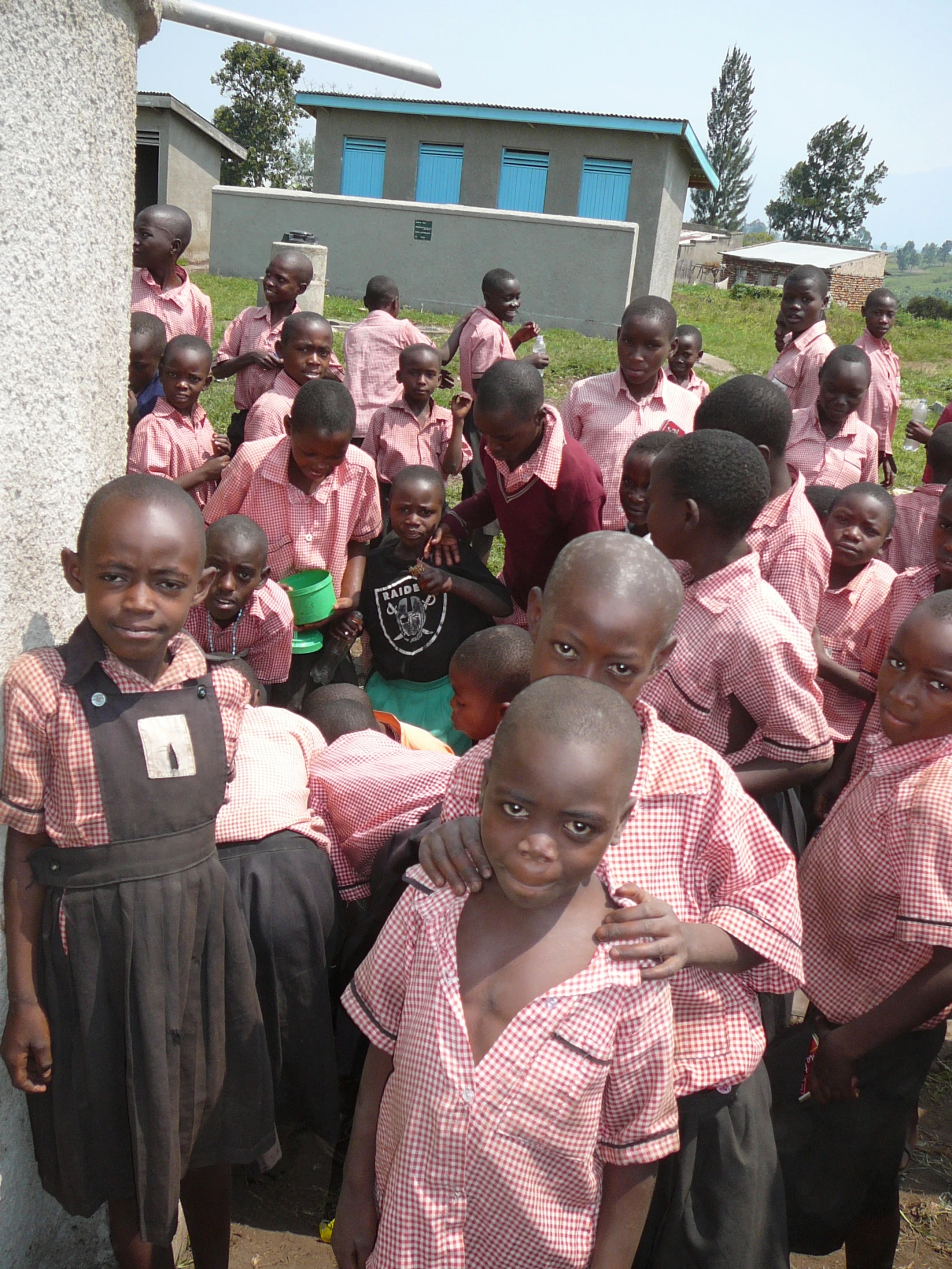 a group of young african children pose together