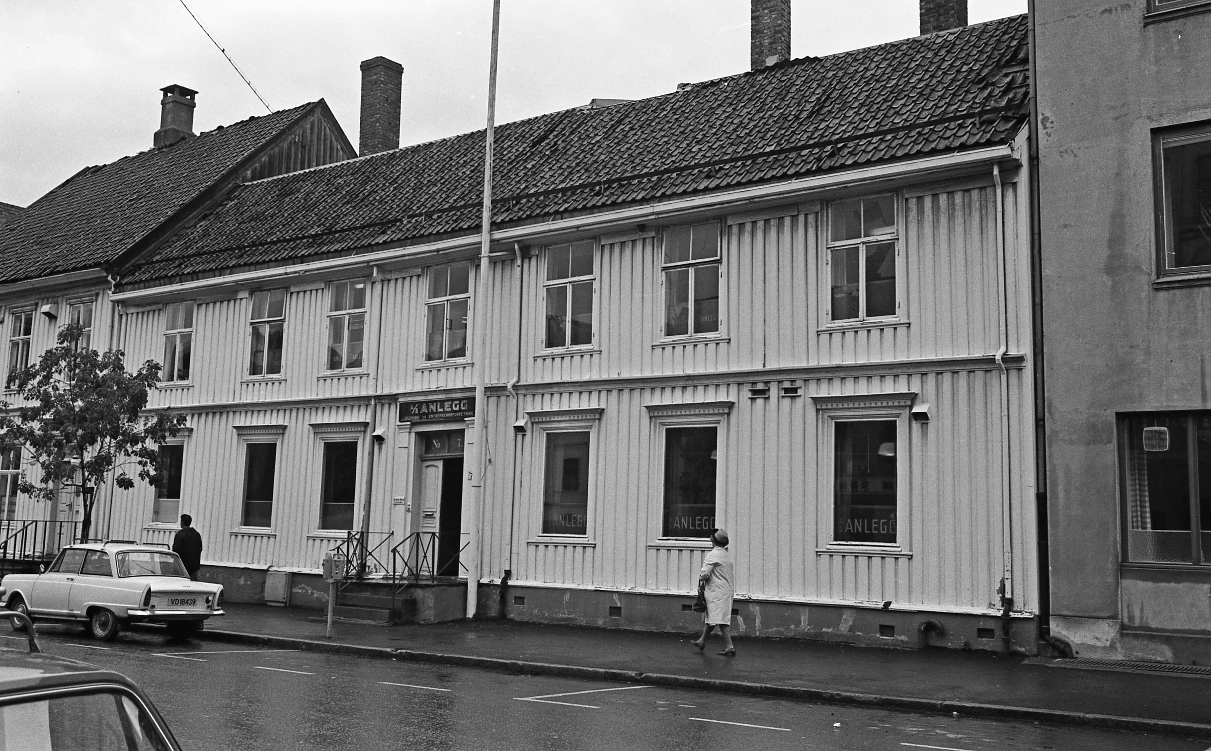 a couple of big buildings on a street