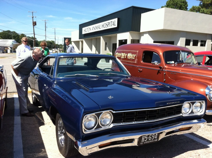 vintage cars are on display in a show