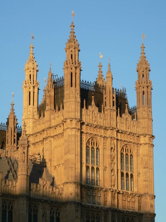 a building with large towers and small clocks