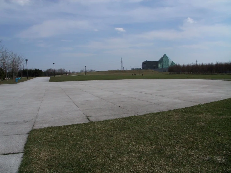 a large open lot with an empty parking lot