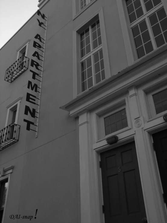 the large building has a number of balconies