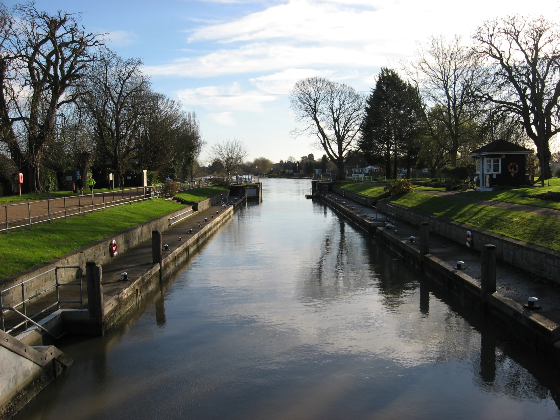 a river runs through a residential area in a country