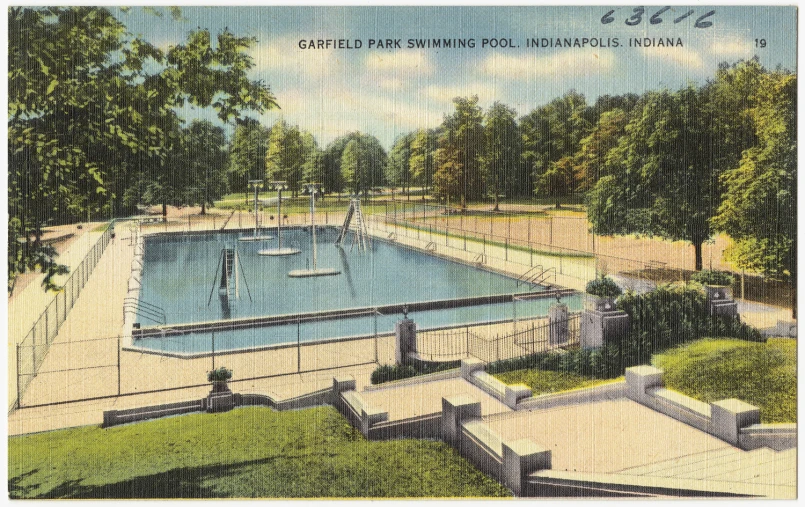 a water filled tennis court sitting next to a tennis court