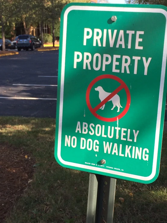 a private property sign in front of a residential area