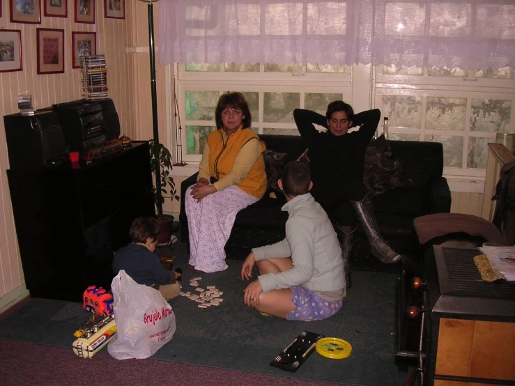 a group of children on the floor in a living room