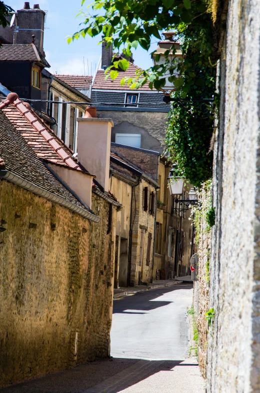 view down an alleyway lined with houses