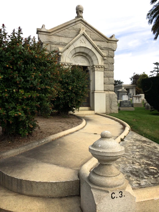 an outside picture of a church and a statue