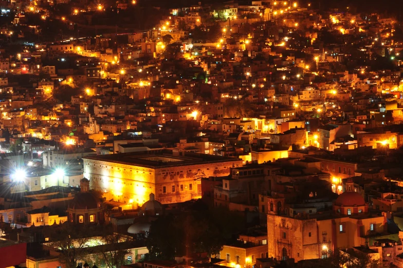 an overview view of a large city lit up at night