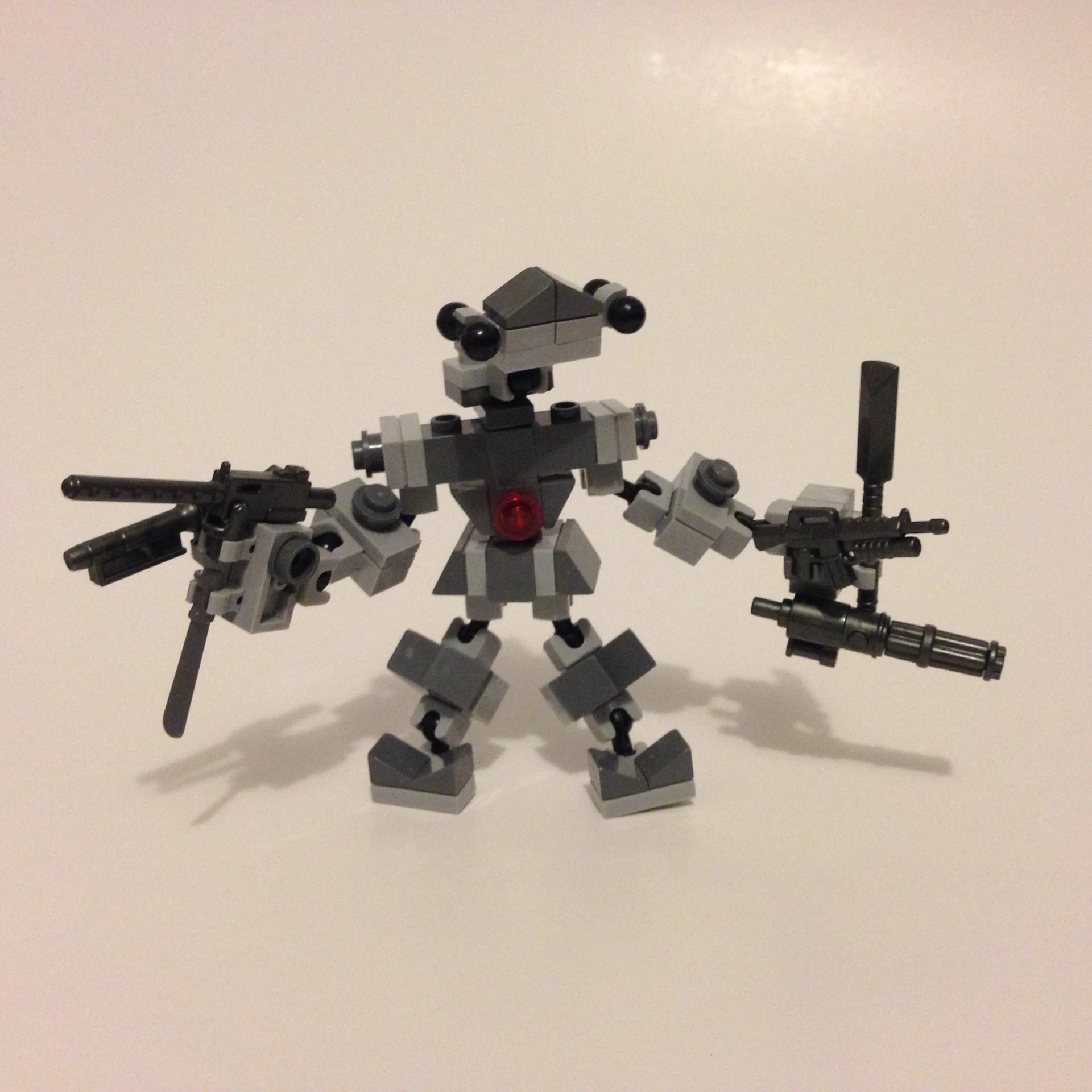 two lego figurines with guns in the shape of animals