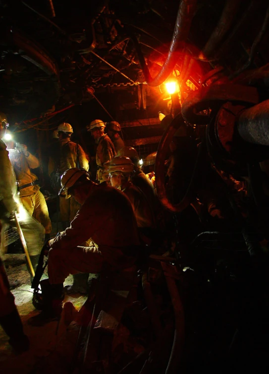 firefighters in an underground space working on the area