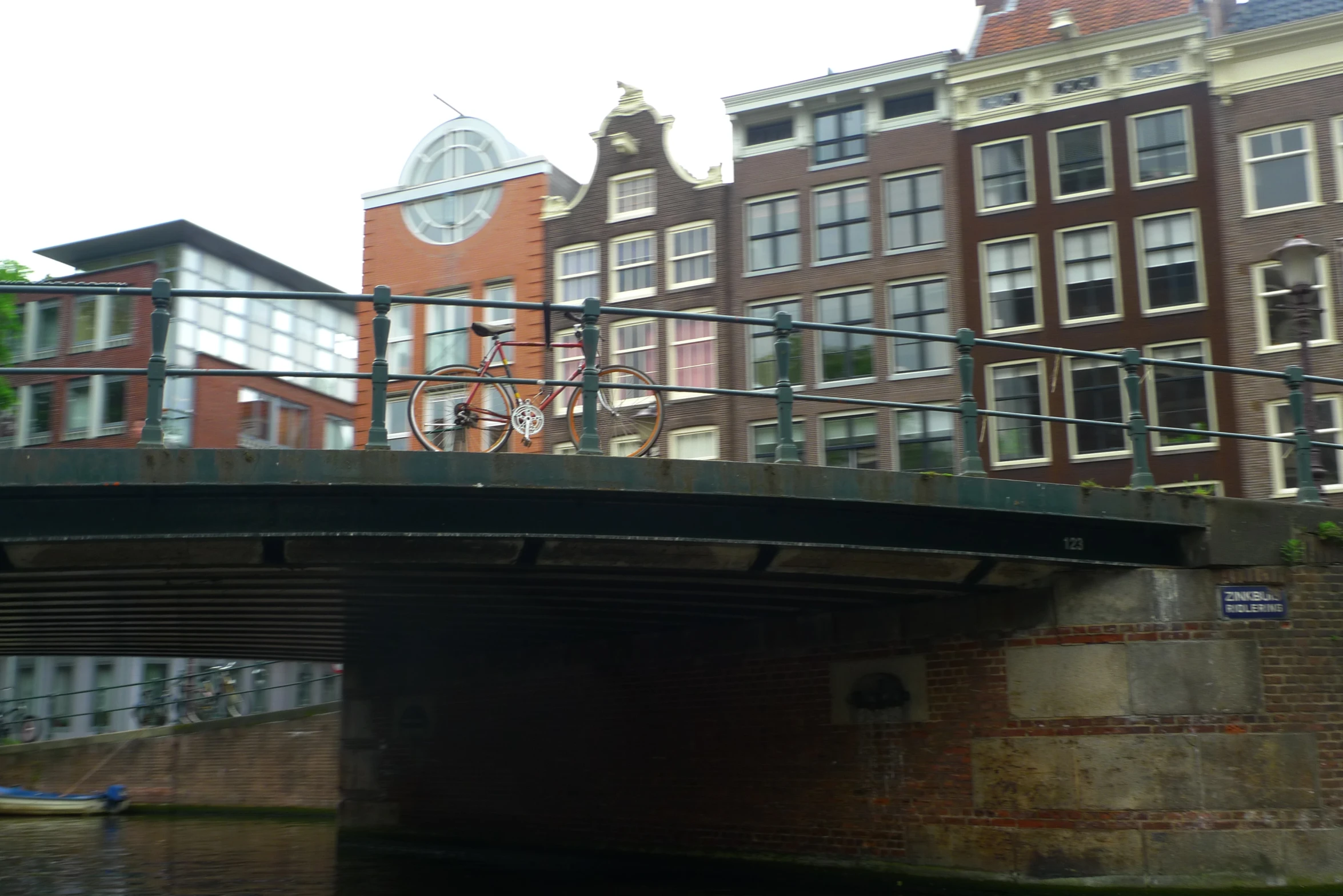 a bridge and bicycles on the side