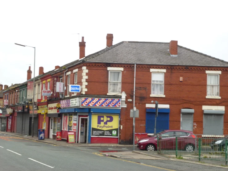 a row of buildings along a street in an urban area