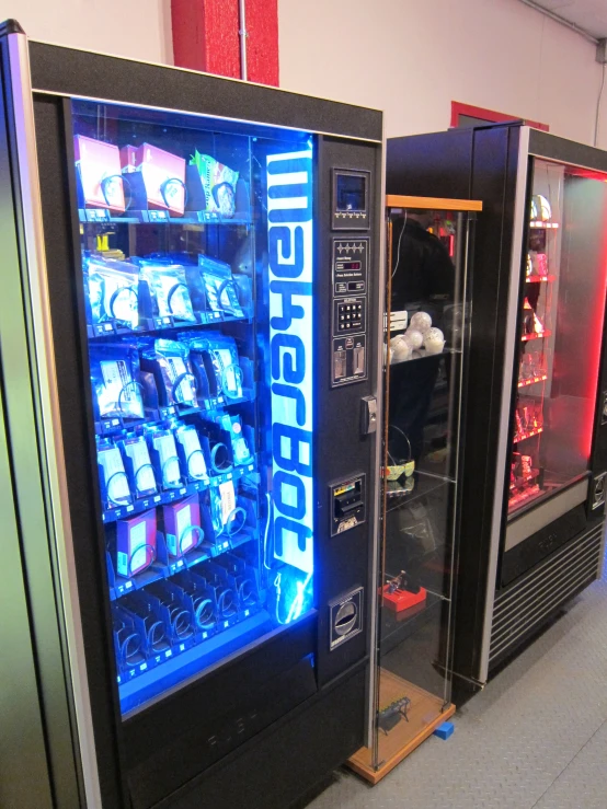 two vending machines in an open, empty building