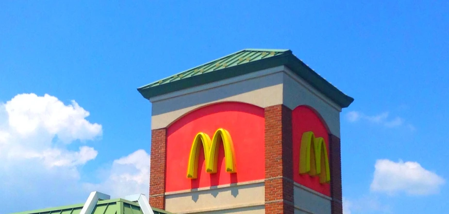 the top of a brick and glass restaurant