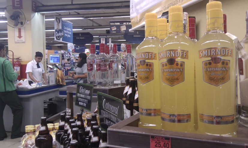 bottles of beer are on display in a store