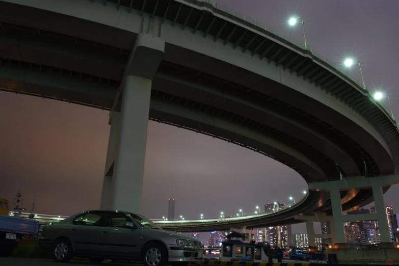 an suv on a highway during the night time