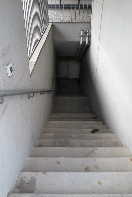 a stair is painted white with light brown stains