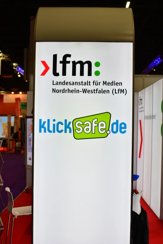 a booth sign is displayed in an exhibition