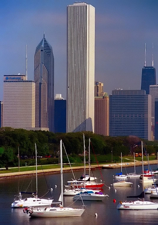 the view of a very large city with many boats