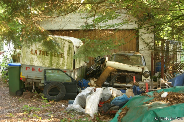 the front of a small shed is being demolished