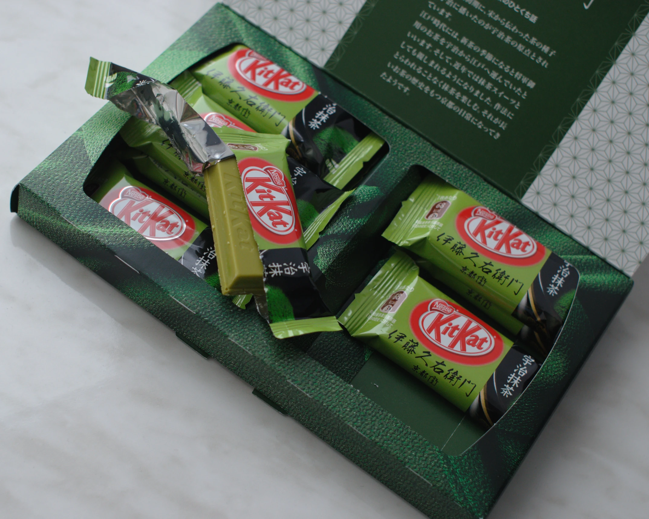 a few boxes of candy sitting on top of a table