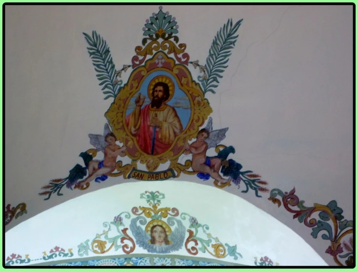 an icon above the doorway of the church