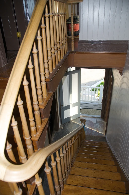 a stairway leading into a wood building