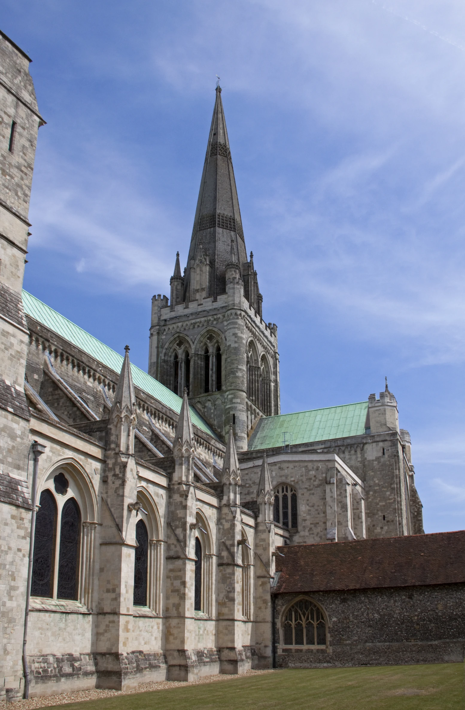 a very tall building with some steeple on top