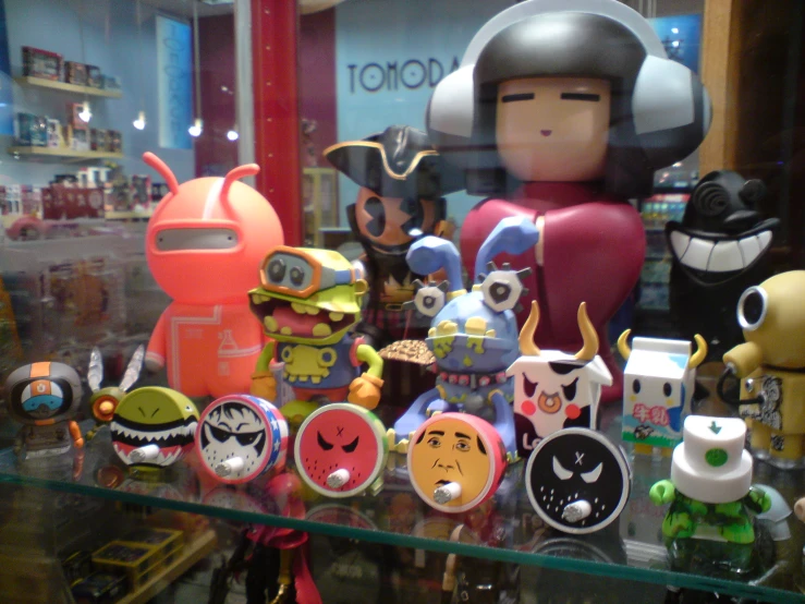 a toy figurine displayed in front of a store window