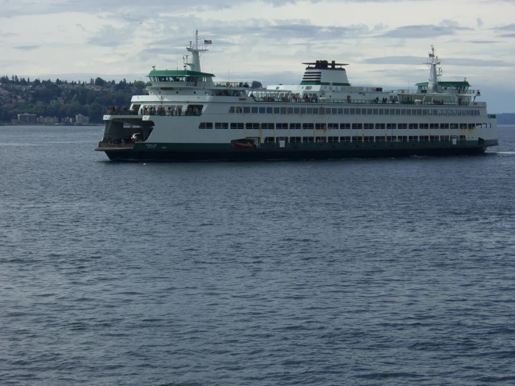 a large cruise ship sailing on a body of water