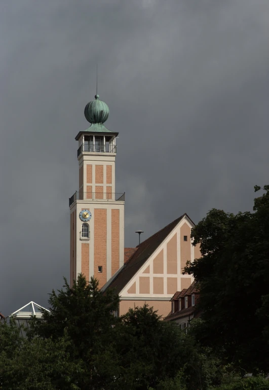 a tall building with a clock and bell tower on top