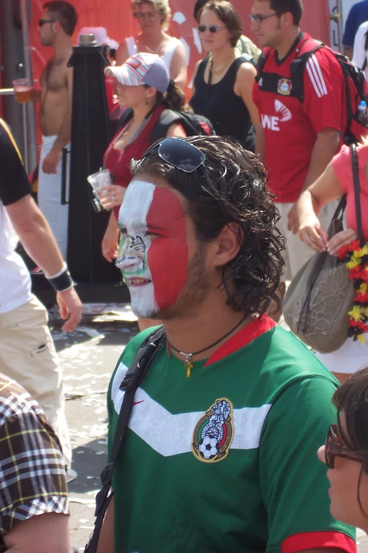 this is an image of man with face painted for football team