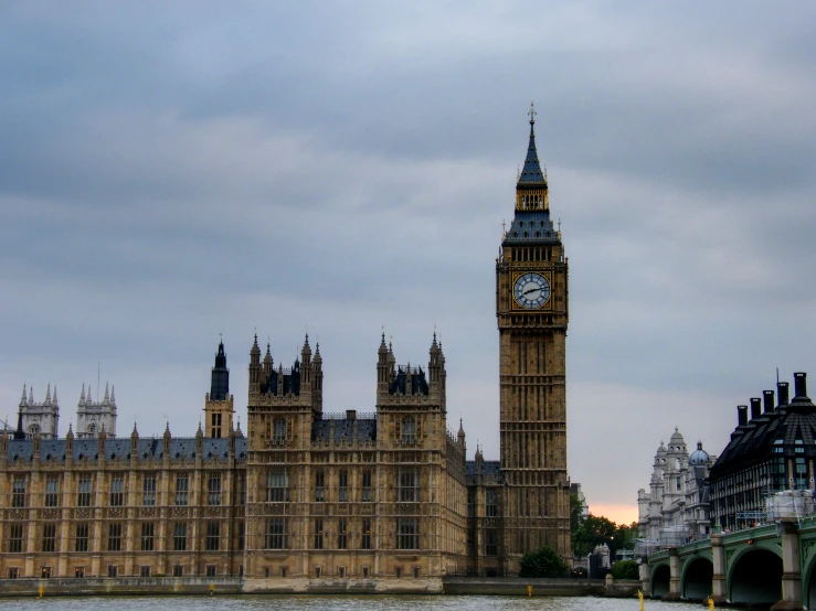 big ben sits alongside the palace of westminster in london