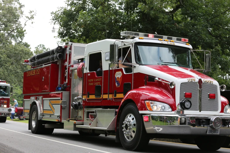 the truck is painted red and white for the fire department