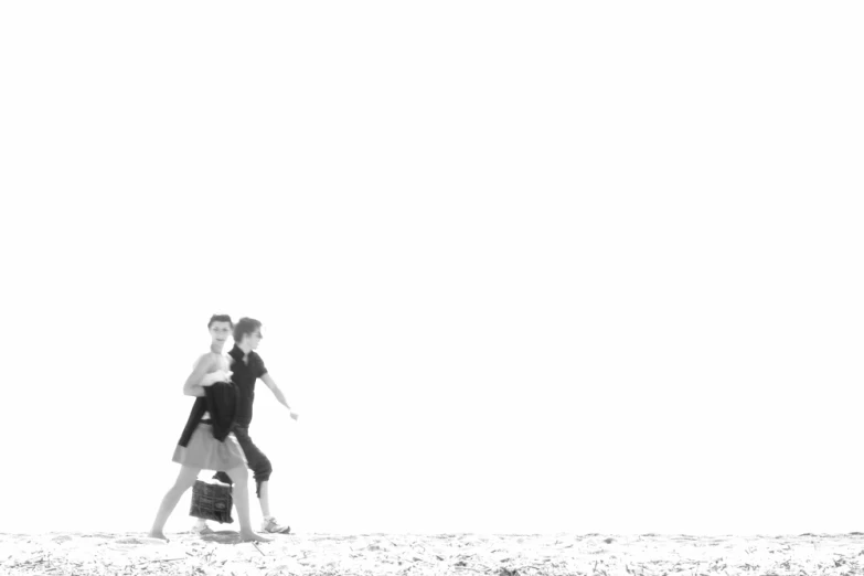 the couple walk through the field with each other