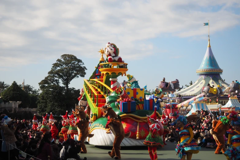 a huge parade float with people around it