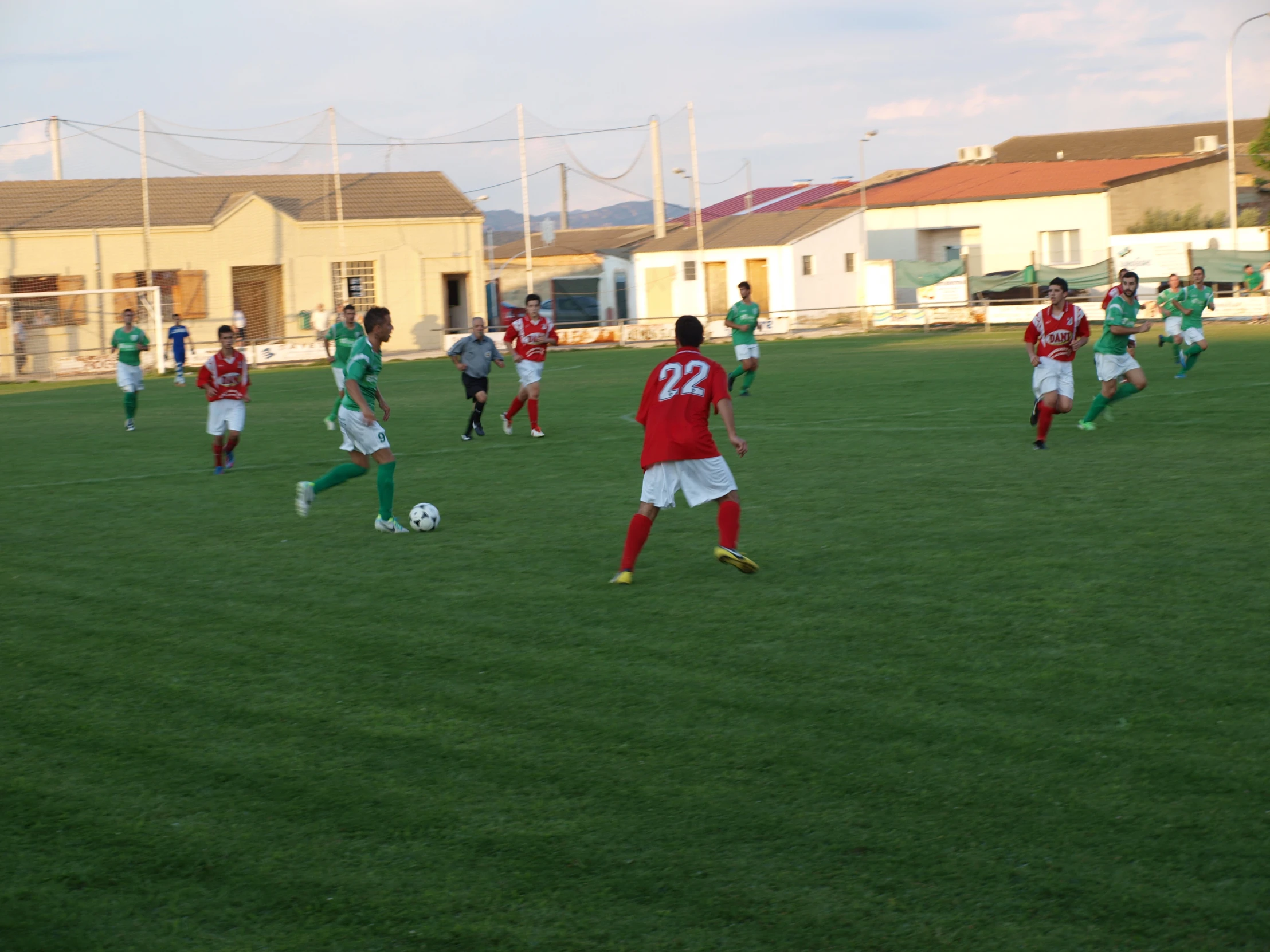 a group of young men playing a game of soccer